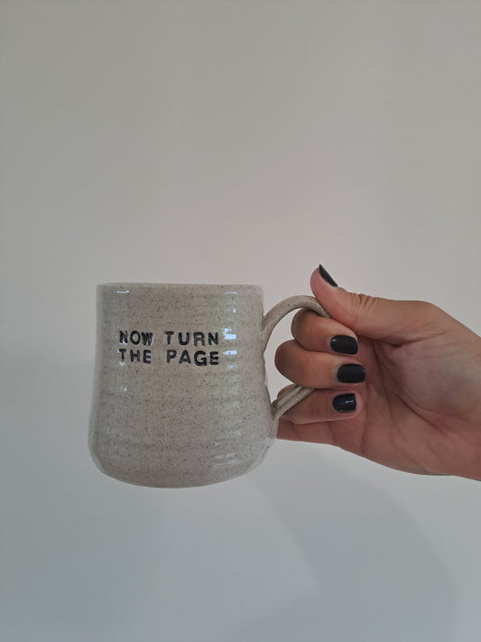 Now Turn The Page Mug