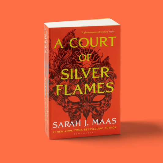Book titled 'A Court of Silver Flames' by Sarah J. Maas on an orange background