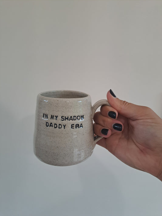 In My Shadow Daddy Era Mug being held by Steph.