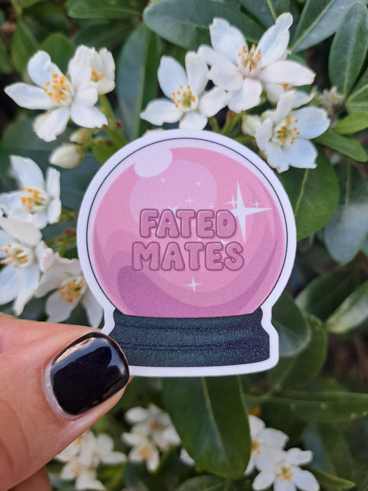 Sticker pink crystal ball with words Fated Mates inside. Steph holding sticker and it's glittery.