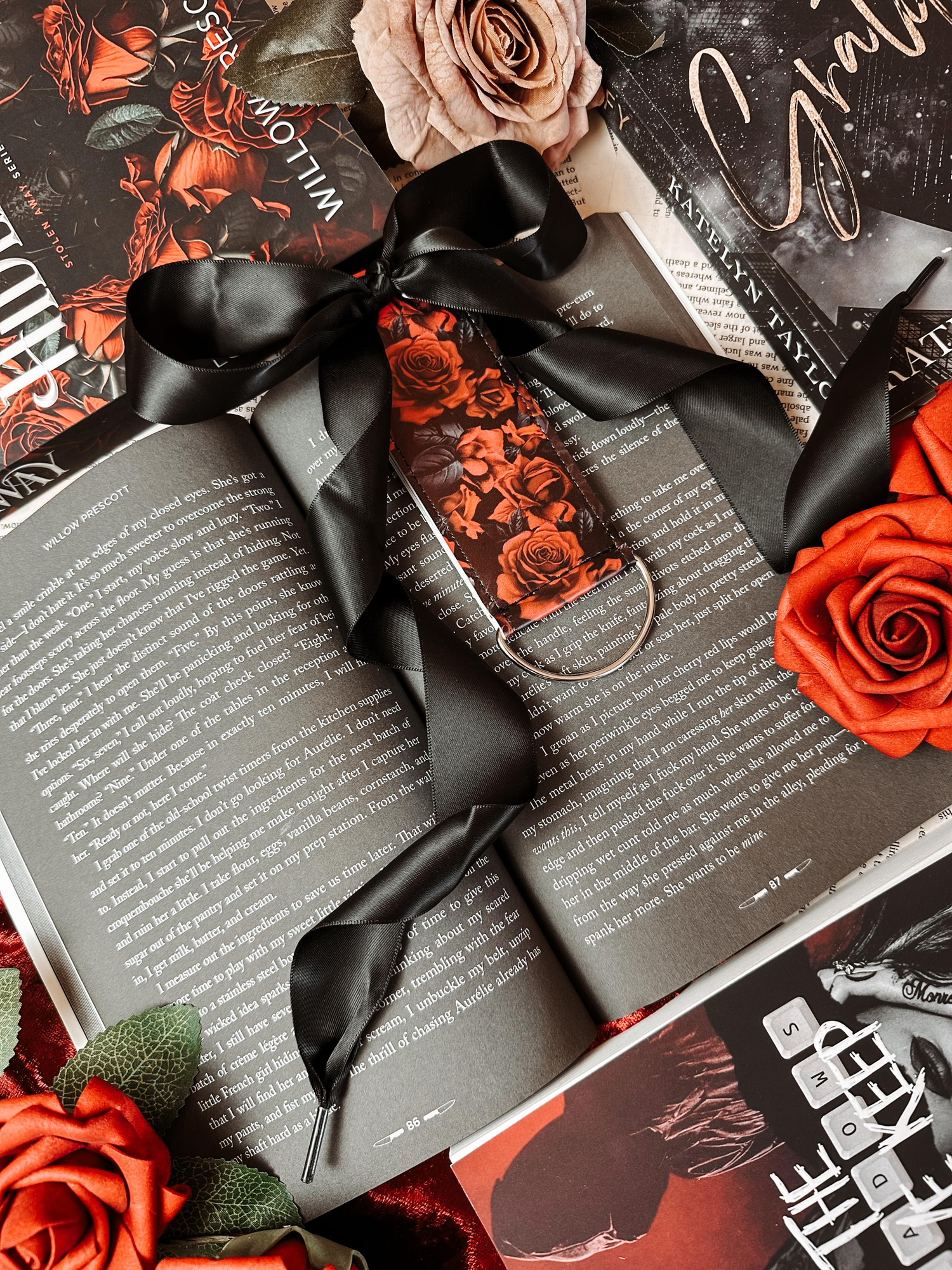 An open book with a Between the Covers bookmark