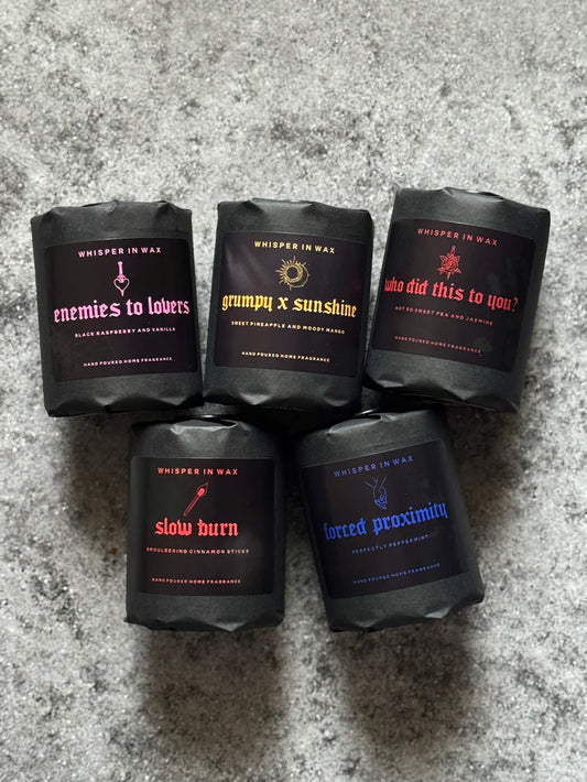 Wrapped in black, Book Trope Candles: Enemies to Lovers, Grumpy x Sunshine, Who Did This To You?, Slow Burn and Forced Proximity.
