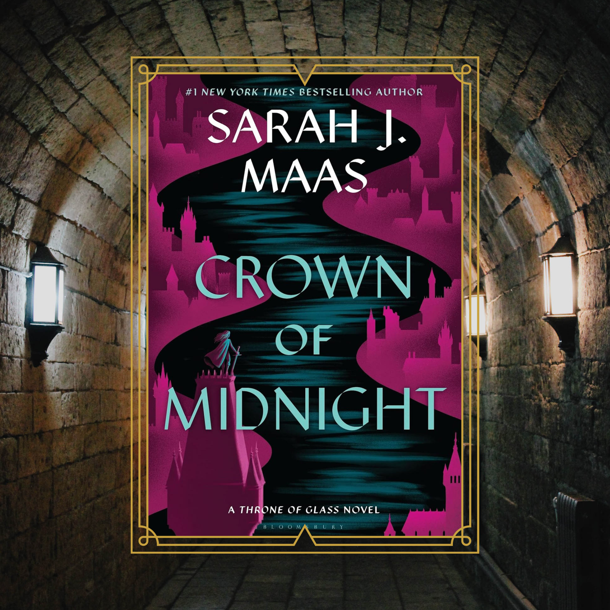 Crown of Midnight by Sarah J Maas book cover with an image of a woman on top of a castle in a cape overlooking a river running through a town. The cover is on a background photo of a brick tunnel.
