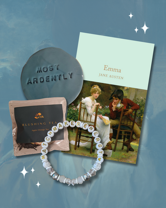 Emma Bundle showing the book, a cookie, a tea and a white bracelet.