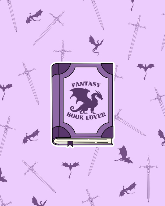 Purple book sticker with a dragon and text: Fantasy Book Lover. Shown on a purple background with dragons and swords.