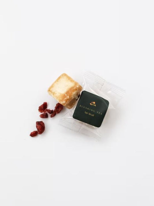 Mr Wolf honey tea cube shown with packaging.