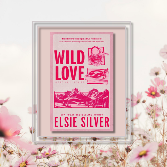 Small town novel Wild Love by Elsie Silver, featuring the book cover with a photo background inspired by its artwork.